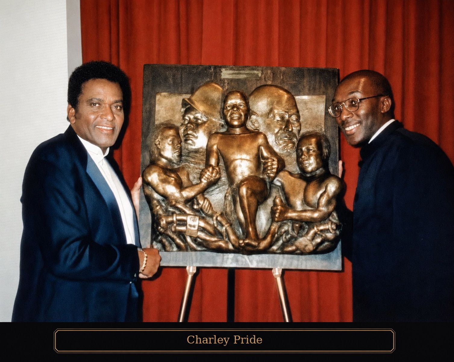 Donald Brown presenting a commissioned bronze work